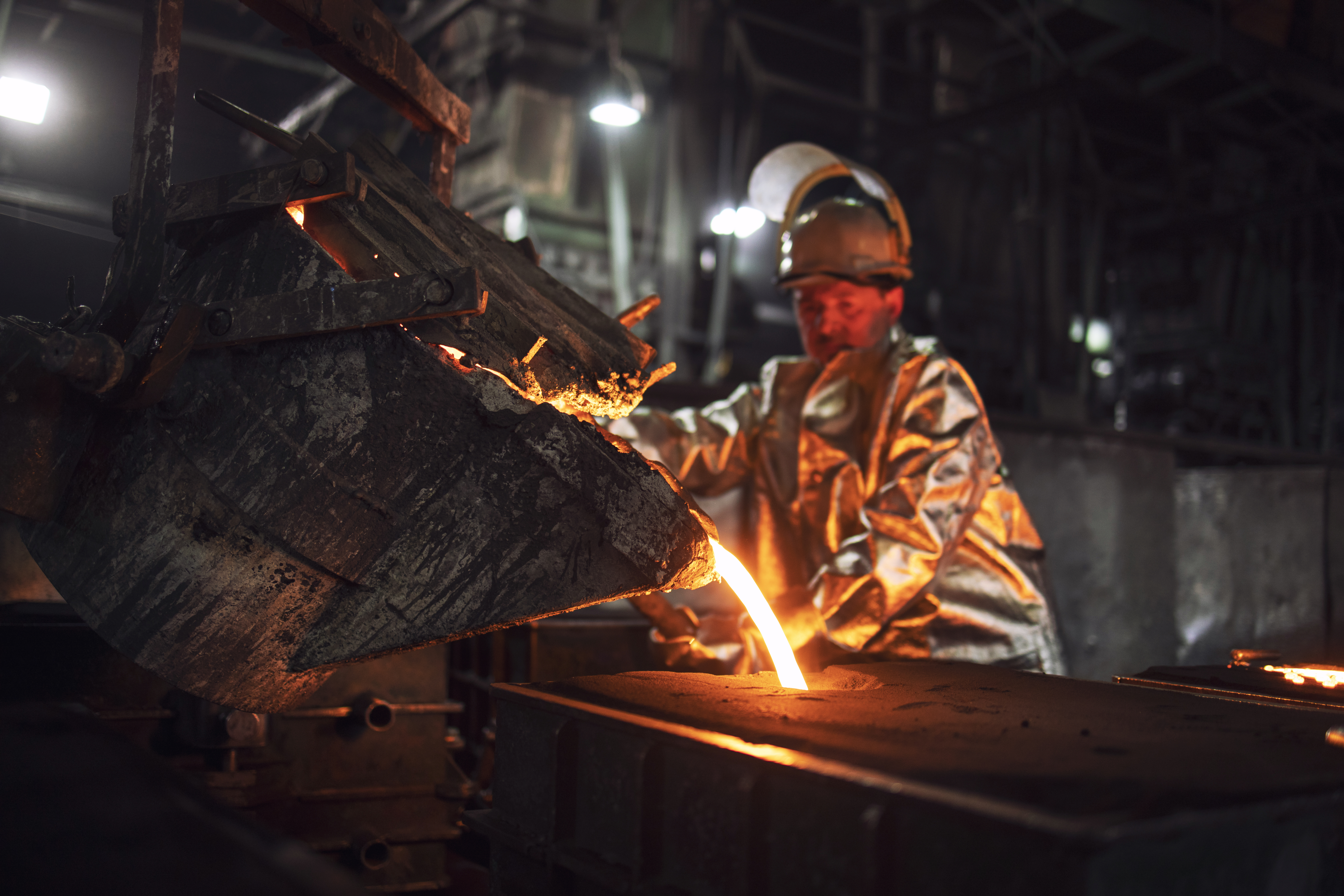 Foundry worker symbolizing industrial growth